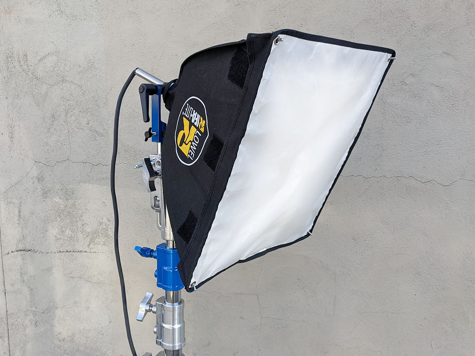 250w or 750w Lowel Rifa + eggcrate